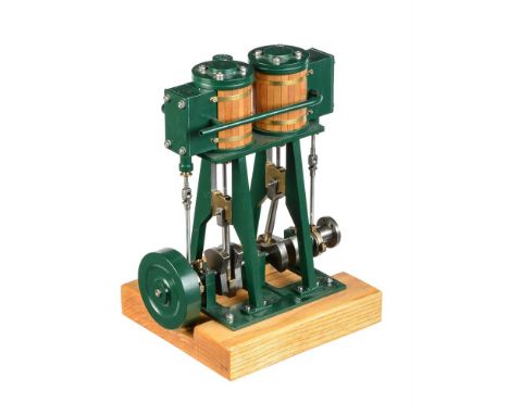A model of a twin simple vertical marine steam engine, built by Mr D Russell of Frazerburgh from his own designs. Having two 