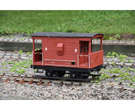 A well built 5 inch gauge guards van No M404171, being of plank construction with fitted handrails, steps and finished in ter
