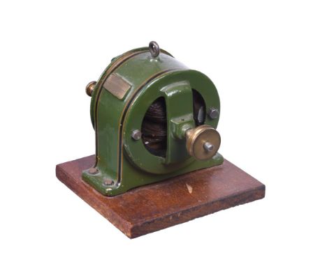 A Stuart Turner 4 to 8 volt dynamo. (2500rpm to 5000 rpm) These dynamos were on offer in the 1957 Stuart catalogue Price £3. 