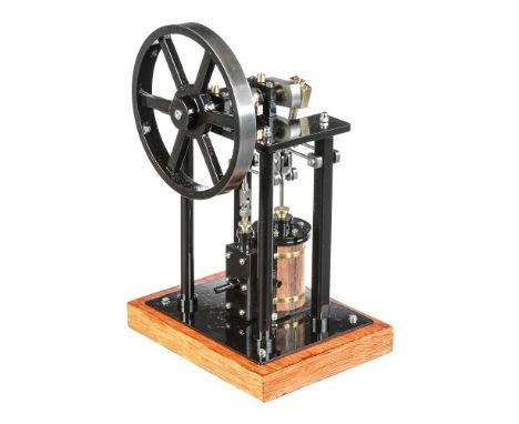 A well-engineered model of an over-type vertical live steam mill engine, built by Mr D. Russell of Fraserburgh based on the S