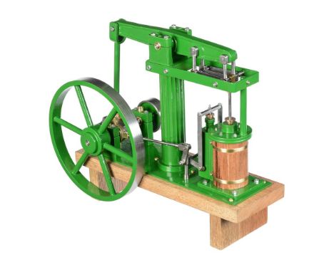 A freelance well engineered model of a live steam beam engine, built by Mr D Russell of Frazerburgh. The beam supported on re