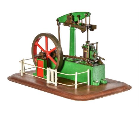 A model of a Stuart Turner live steam beam engine, the turned central column supporting beam with split gun-metal bearings, W