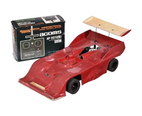 A rare PB Racing Products PB6 RC nitro racing car with Can-Am style GT body, circa 1979, with alloy plate chassis with nylon 