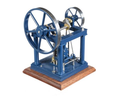 A well-engineered model of an over-type vertical live steam engine, built by Mr D. Russell of Fraserburgh, based on the Tuxfo