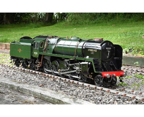 An exhibition standard 5 inch scale model of a British Railways 9F 2-10-0 tender locomotive No 92220 'Evening Star'. The silv