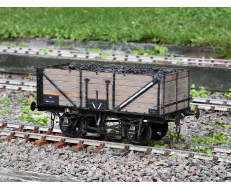 A 5 inch gauge seven plank open wagon No M260500, of steel and wood construction with opening doors and full chassis detail. 