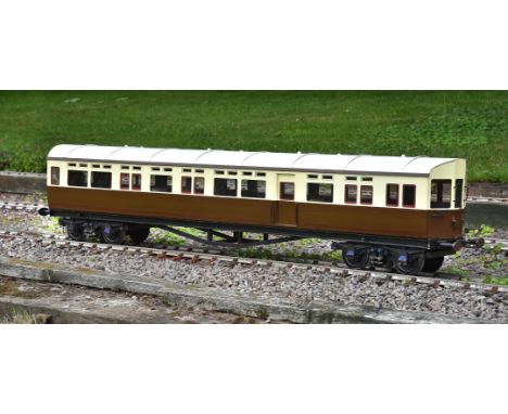 A well built model of a 5 inch gauge Great Western Railway passenger auto-coach, finished in brown and cream livery with fitt