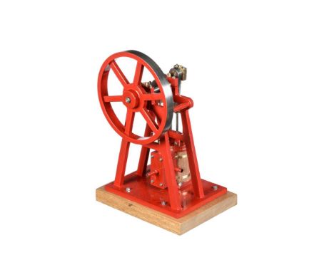 A well engineered model of an over-type vertical steam engine, built by Mr D Russell of Frazerburgh to his own design. The ov