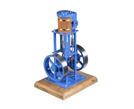 A well engineered model of a vertical live steam stationary engine, built by Mr D Russell of Frazerburgh. The single cylinder