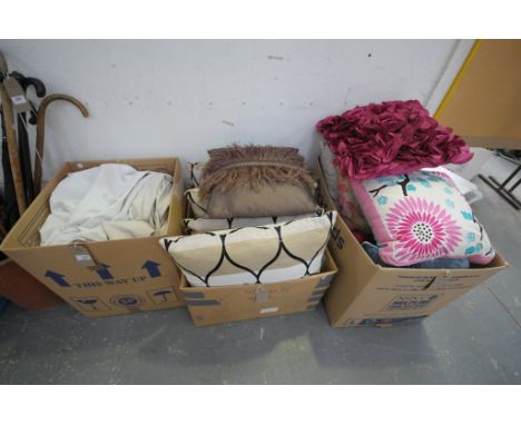 A Collection of modern cushions and curtains to 3 boxes.