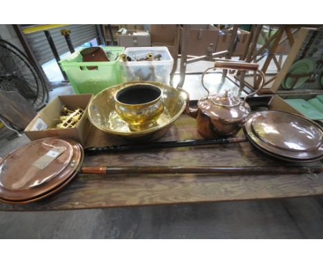 An Antique copper warming pan with an ebonised turned handle, a second copper warming pan, bras ornaments, brass cream bowl a