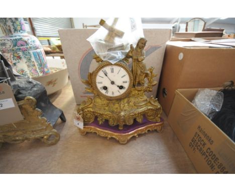 A 19th Century French gilt Spelter mantle clock
With a 8cm white dial with Roman numerals the two train movement with outside