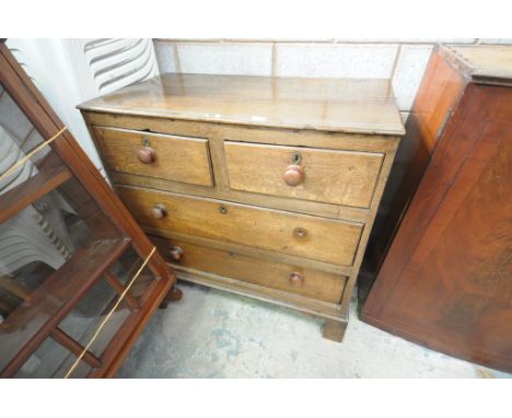 An 18th Century oak chest of drawers
The rectangular plank top with a moulded border above a plain frieze with two short and 