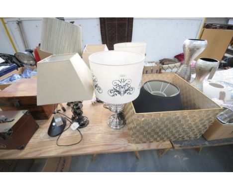 A Pair of modern chromed table lamps, a bobbin shaped chromed column table lamp, 4 other assorted lamps and shades.
