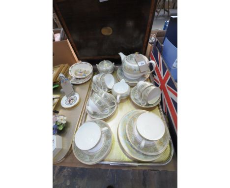A Wedgwood " Columbia" 28 piece tea service including teapot. CONDITION REPORT: One crack to 1 cup.
Some tea staining inside 