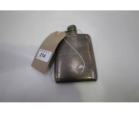 A Concave silver hip flask with a hinged cap and cork stopper.( total weight 6.5 ozs )