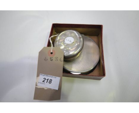 A Silver plated hinged snuff box and a circular silver compact. (2)