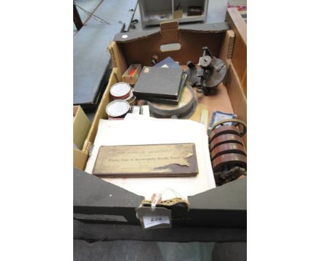 A Collection of watchmakers tools and effects to a box, an altitude gauge, watch parts, etc.