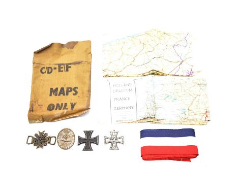Two World War II issue silk maps, of Western Europe; a miniature compass in a 'Maps Only' pocket; a Nazi pennant; Iron Cross;