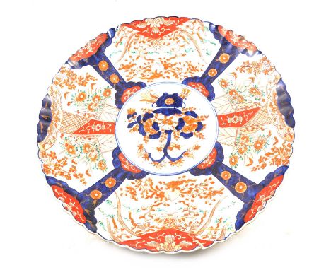 Large Japanese Imari charger, circular slightly lobed dished form, decorated in the traditional palette, 46.5cm.Condition rep
