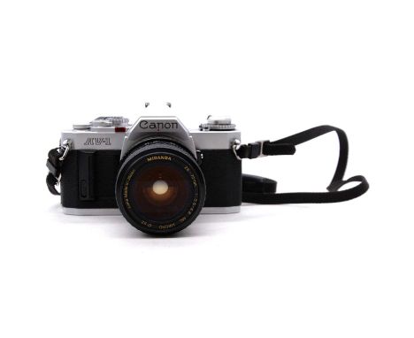 Canon AV-1 camera with 28-70mm lens.