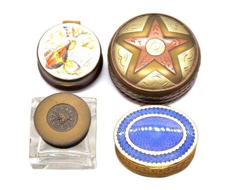 An oval metal powder box, blue and white enamel guilloche cover with mirror to interior, 53x43mm, with a small down powder pu