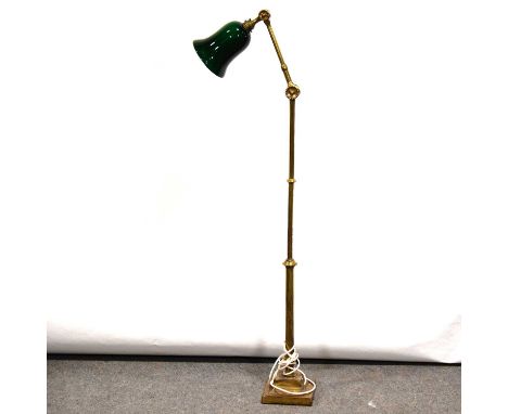 Dugdill brass adjustable lamp, the plain couln with two hinges, supported on a weighted stepped square base, with green opaqu