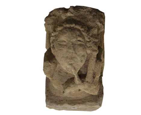 Two Medieval carved stone corbels, each with a figurehead, badly worn, depth 42cm, width 23cm; and three other carved archite