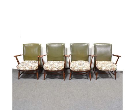 Four Ercol style easy chairs, leatherette backs and loose cushion seats, turned legs and rails, width 66cm, height 81cm.Qty: 