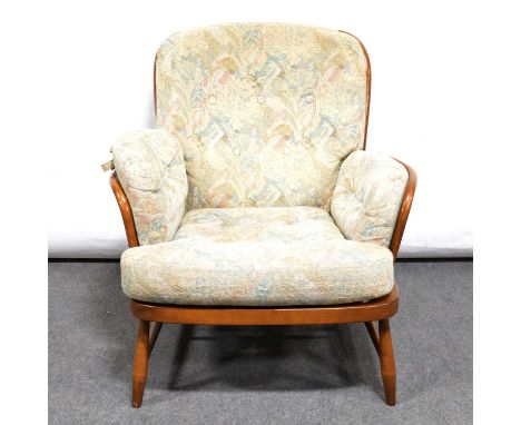 Ercol 'Evergreen' armchair, spindle frame, loose cushions, width 82cm, height 82cm.