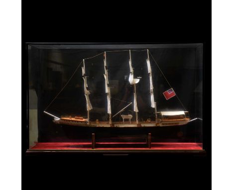 Hand built wooden scale model of a four masted ship, in a mahogany and glazed case, 68x108cm.