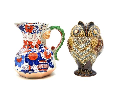 A Doulton Lambeth stoneware owl tobacco jar and cover with tamper, impressed M and KD, 20cm (body cracked); a Mason's Ironsto