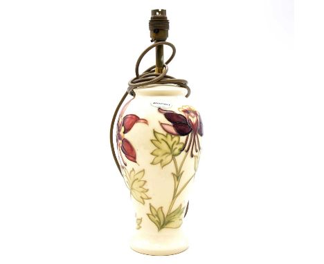 Moorcroft Pottery, a 'Columbine' pattern lamp base, 1980s, 37cm including fittings.  Condition report:No chips cracks or rest