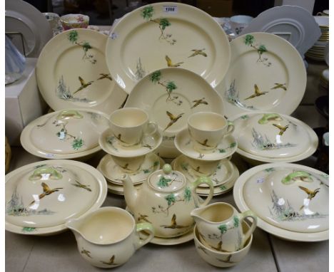 A Royal Doulton The Coppice pattern part dinner and tea service, including four circular tureens and covers, dinner and side 