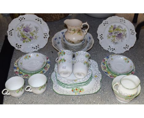 Ceramics - a 1920's floral printed part tea service, for six, comprising cups, saucers, side plates, bread and butter plate, 