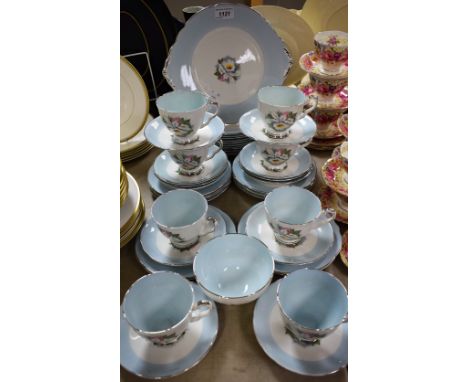 A Royal Stafford White Lady pattern tea service including side plates, cake plate, cups and saucers, etc