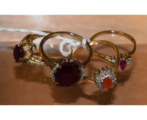 Rings - a ruby and diamond accented cluster ring; others, similar, ruby, orange stone etc, each 9ct gold shank, 13.1g gross (