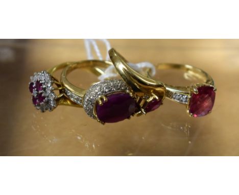 Rings - a diamond and ruby cluster ring, 18ct gold shank, 4.8g gross; another 14ct gold, 3.6g gross; others 9ct gold, 9.1g gr