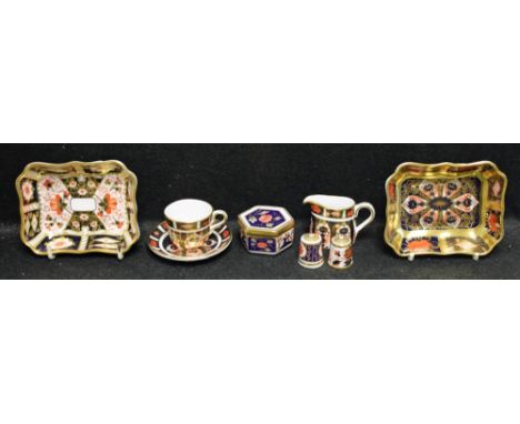 A Royal Crown Derby 1128 pattern miniature cup and saucer; a similar miniature cream jug; a trinket dish, 1128 pattern solid 