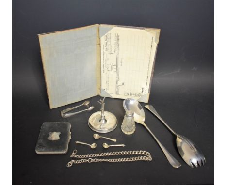 A pair of silver salad servers, Sheffield, approx 160g; a silver mounted leather telegram case, with blank telegram forms; a 