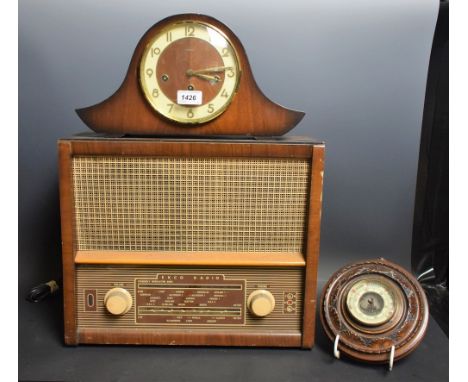 An EKCO valve radio, Model U243; a Tempora Napoleon hat mantel clock; a circular wall barometer (3)