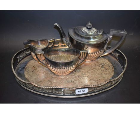 An EPNS three piece boat shape half fluted tea service, an electroplated silver on copper two-handled galleried serving tray 