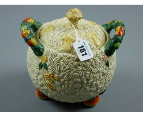 A Clarice Cliff Celtic Harvest biscuit barrel, printed mark to the base 'Clarice Cliff, Newport Pottery Co, England' with emb