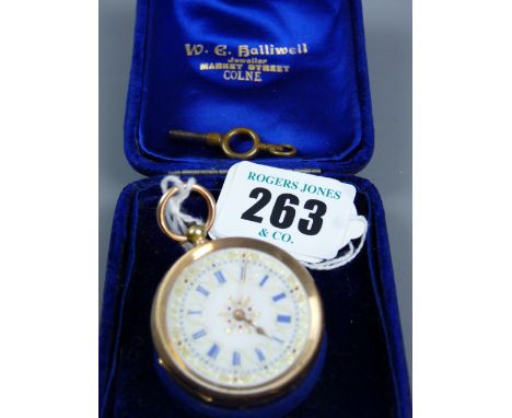 A fourteen carat gold bright cut lady's keywind fob watch with white enamel dial, blue Roman numerals and leaf decoration
