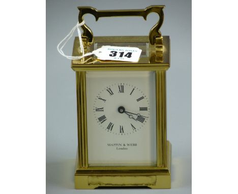 A brass carriage clock, 20th Century Mappin & Webb London carriage clock set within a brass and bevelled four glass case, ele