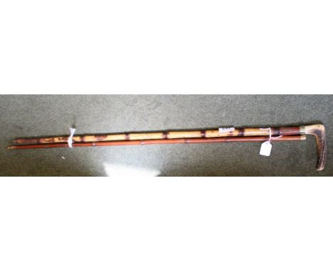 Yellow metal topped swagger stick and horn and white metal stick
