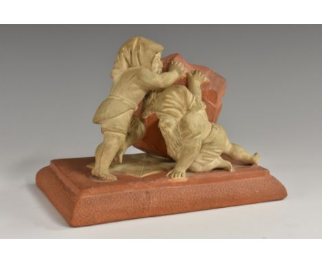 A German two-tone terracotta desk weight, modelled as two gnomes, pushing at a boulder weighing down an envelope, 14cm wide, 