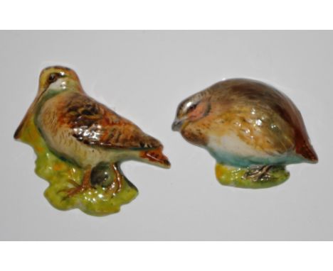 A Royal Worcester miniature plaque/toy in the form of a snipe, the other a quail, printed marks to base 