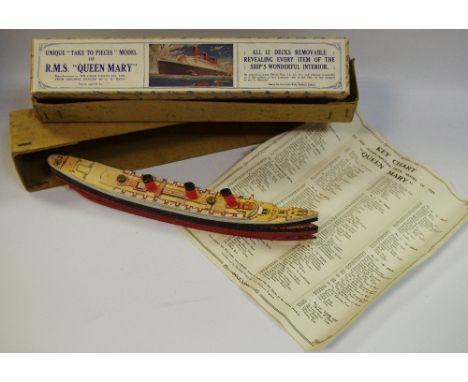 A Chad Valley "Take to pieces" model of RMS Queen Mary in original box and key chart with original protective outer box.