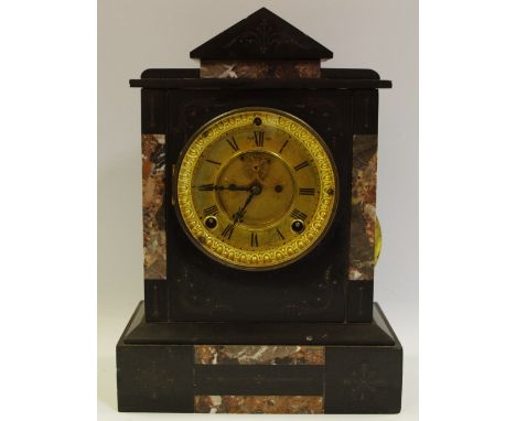 An Ansonia black slate mantel clock architectural pediment, brass chapel ring, Roman numerals, open escapement, plinth base